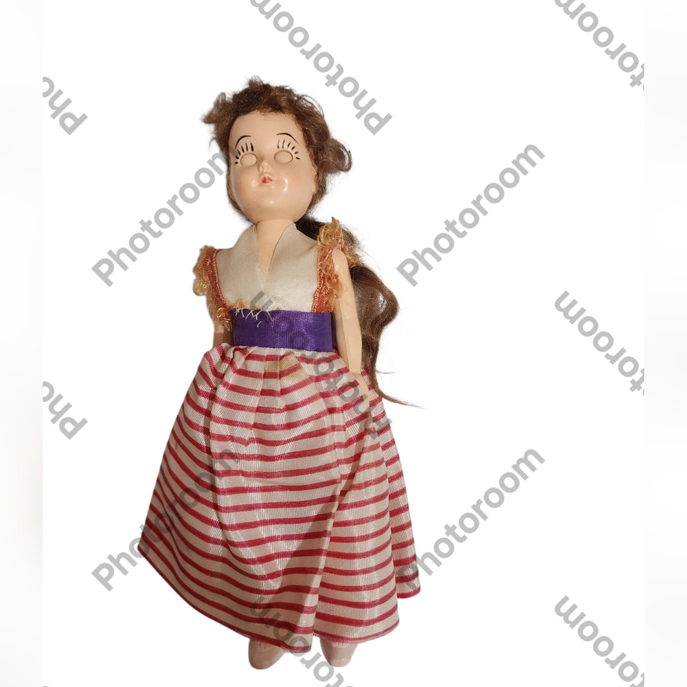 Classic Doll with Striped Dress and Purple Sash